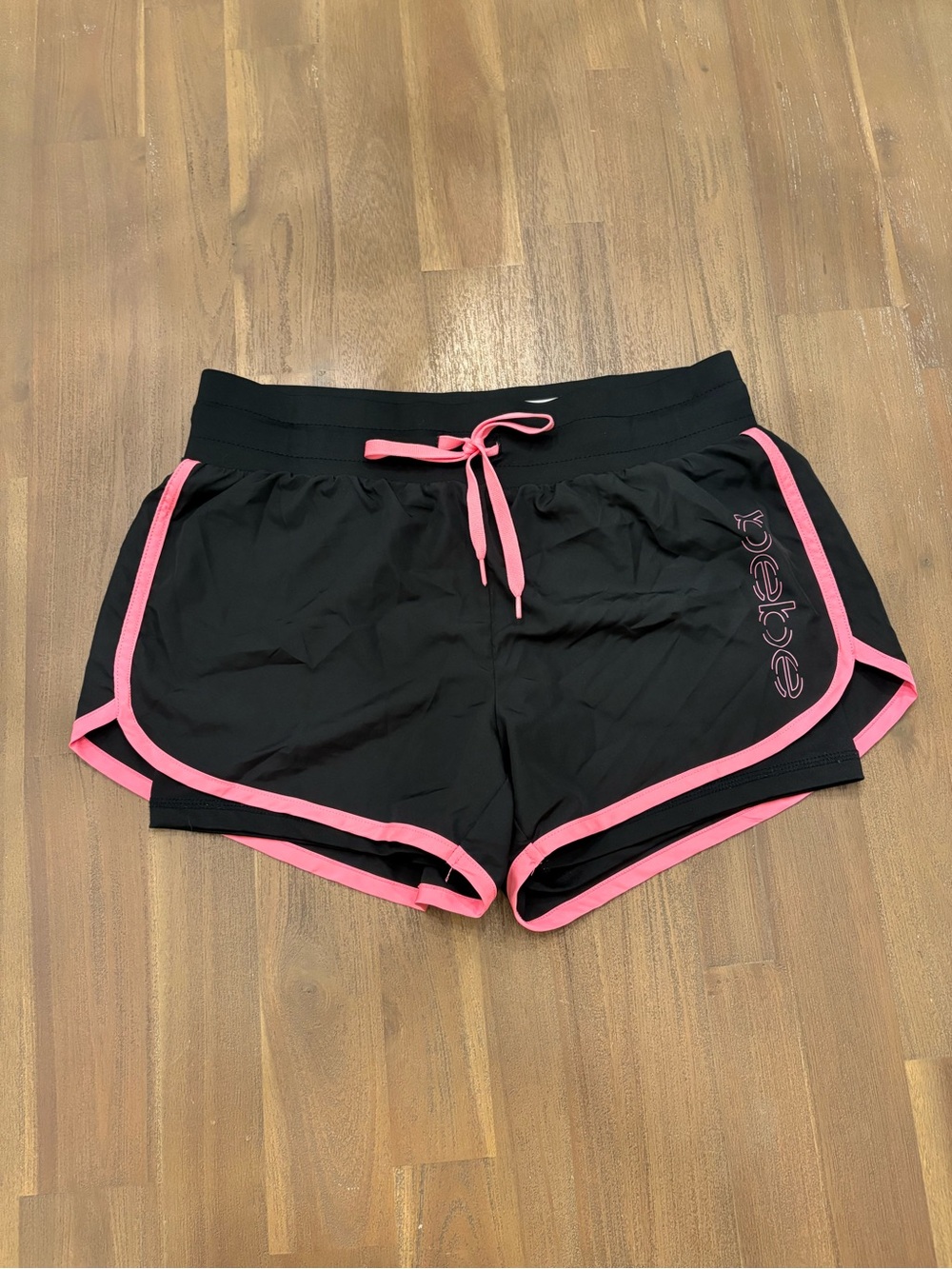 Vintage Bebe Women's Black Running Shorts with Pink Trim